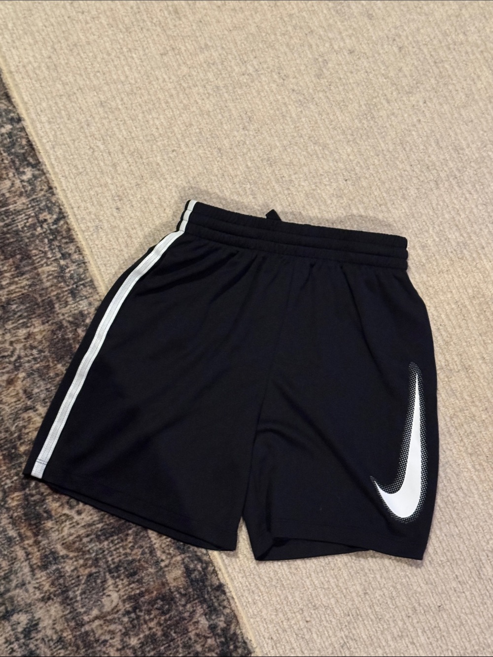 Nike Black Kids Athletic Shorts with White Swoosh
